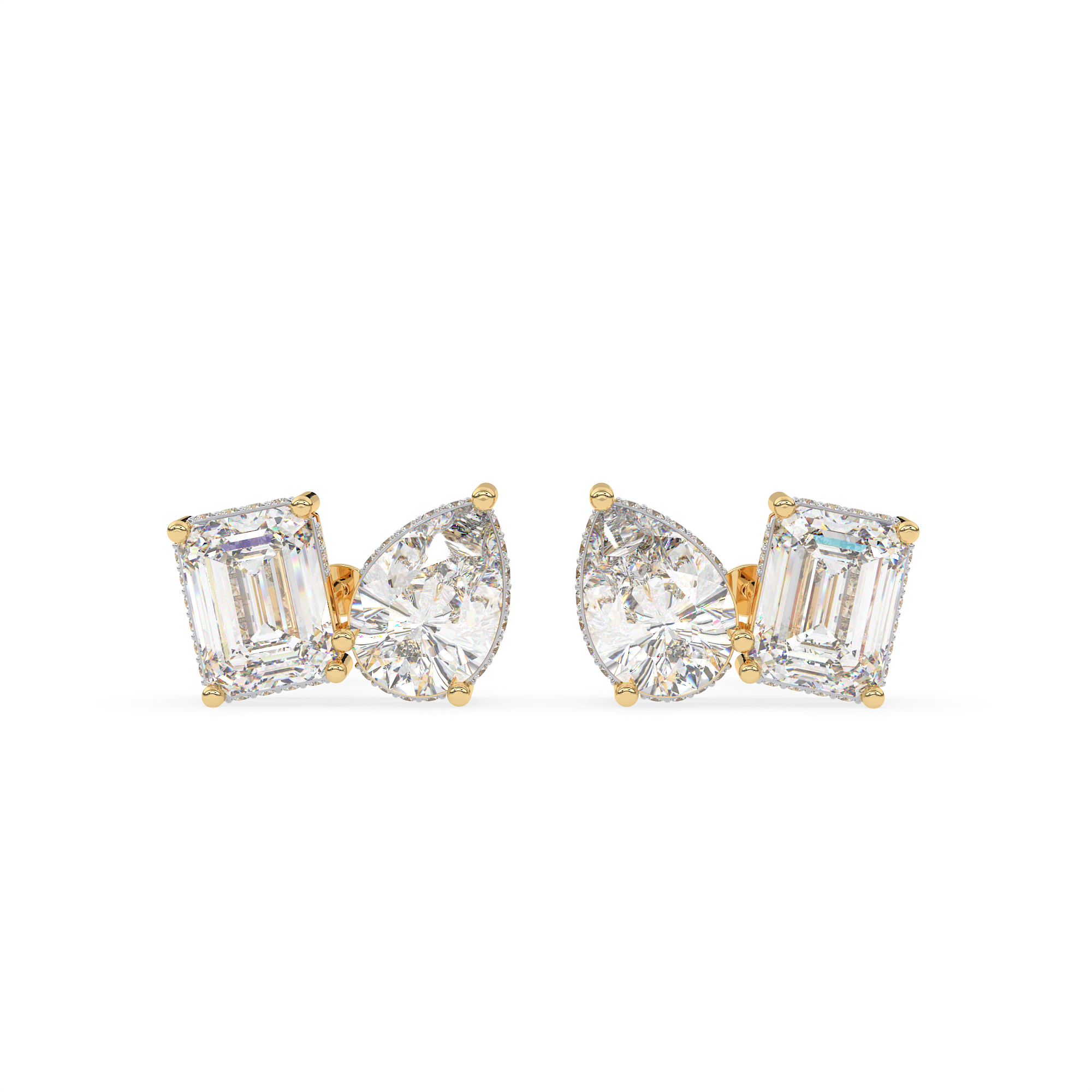 4 carat Emerald cut and pear shaped diamond stud earrings.