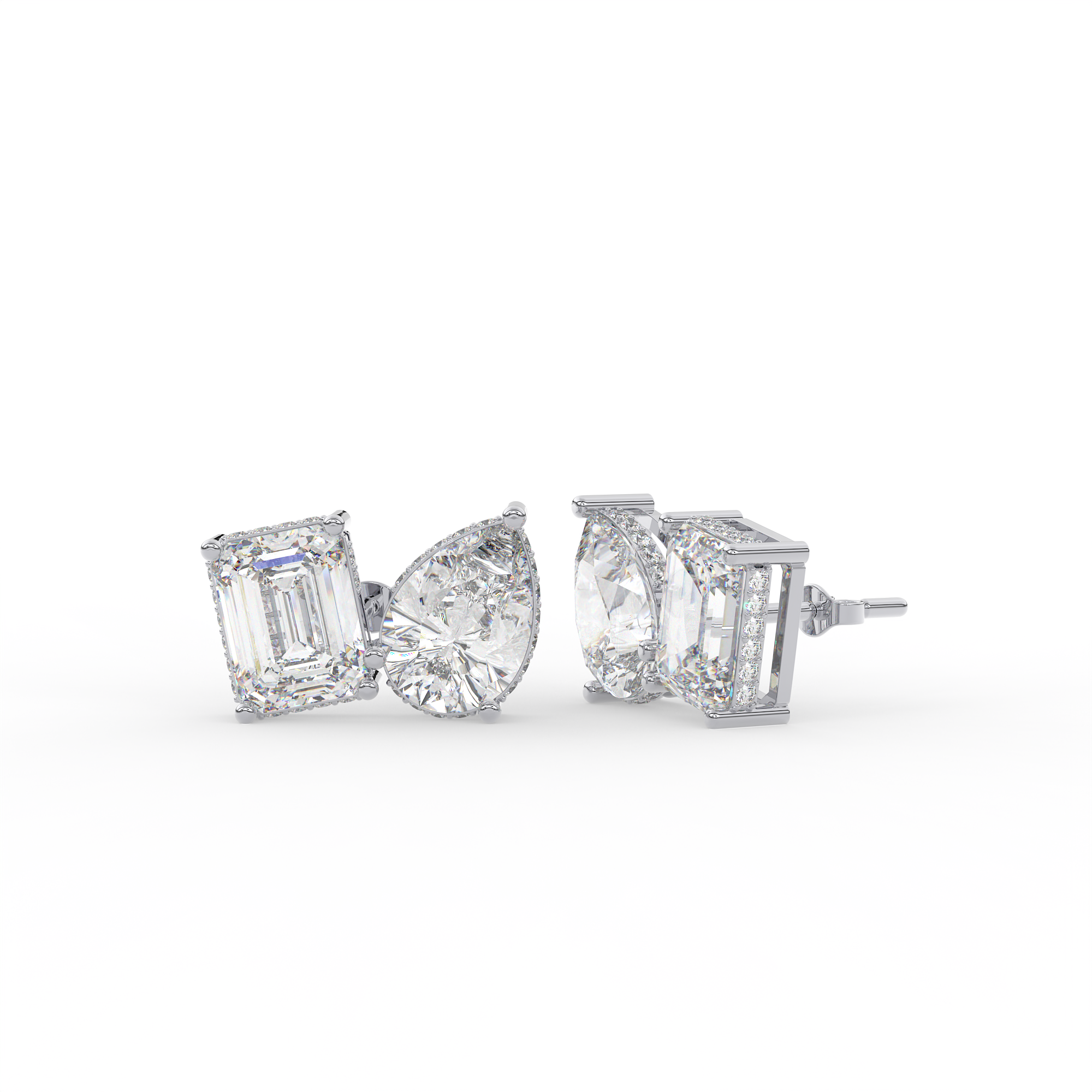 4 carat Emerald cut and pear shaped diamond stud earrings.