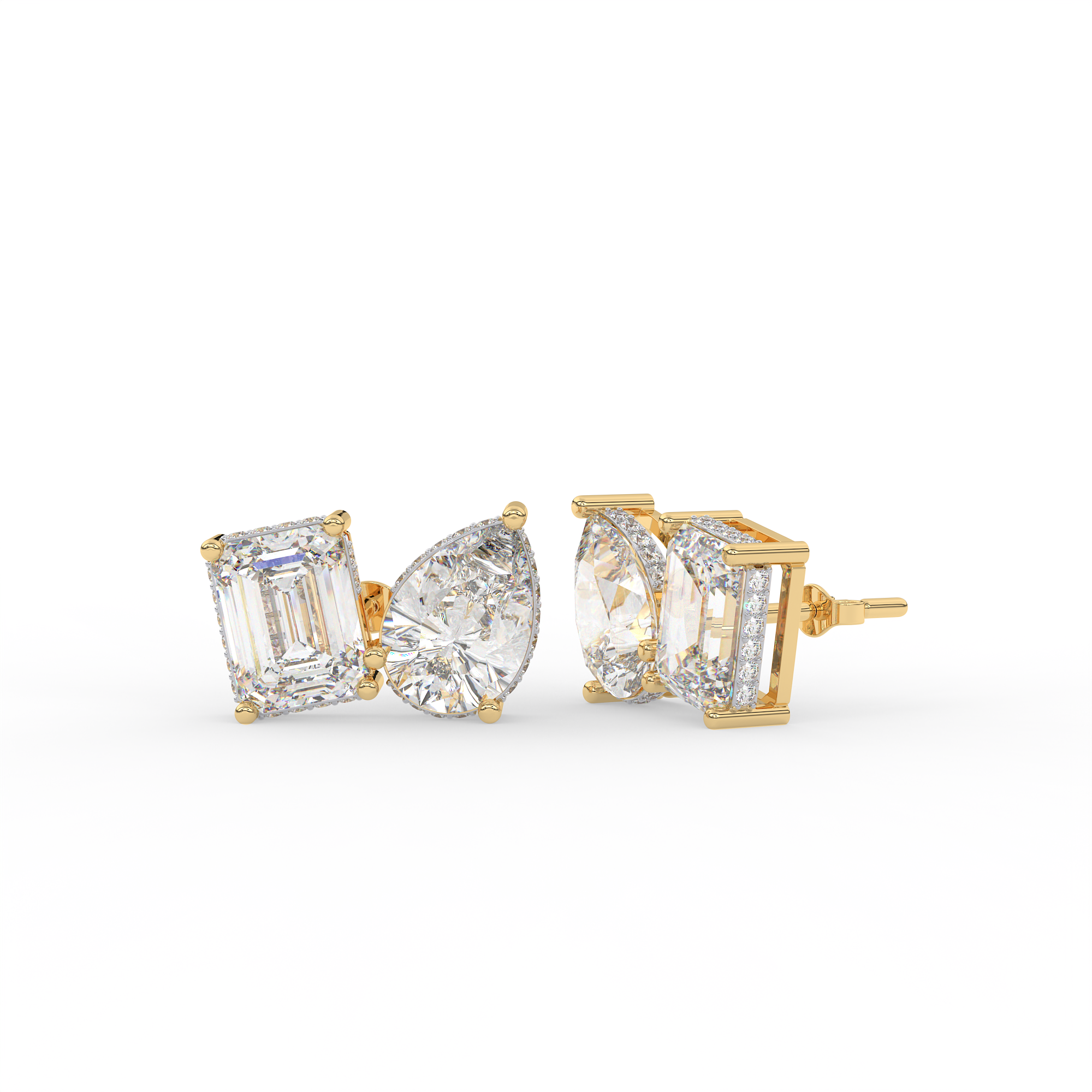 4 carat Emerald cut and pear shaped diamond stud earrings.