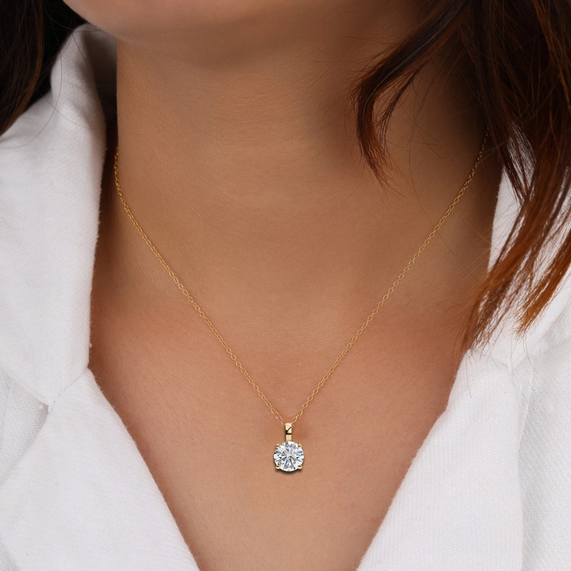 18k yellow gold solitaire diamond pendant featuring 3 carat stone with chain